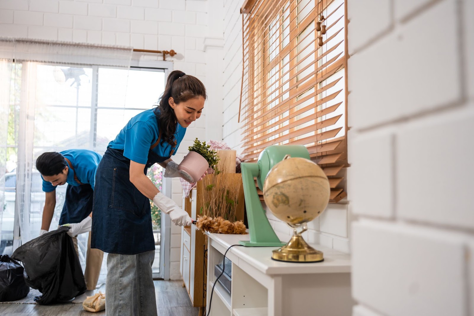two people doing house cleaning